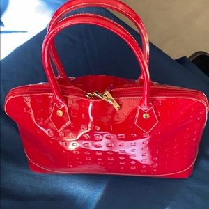 Bright red patent leather Arcadia handbag